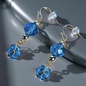 Gold Tone and Blue Glass Bead Dangle Earrings Accented with Blue Flowers